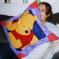 front of Pooh cushion