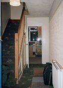 cream walls and bare banisters