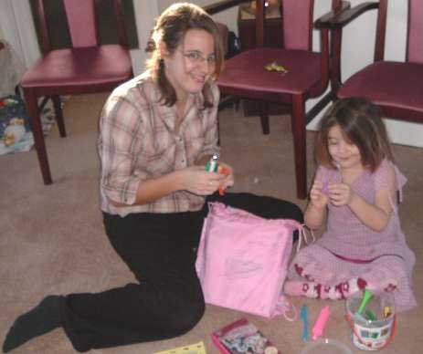 Kati plays with Ruth on the floor