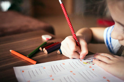 child with a pencil